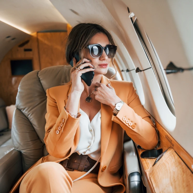 Sophisticated woman on a private plane